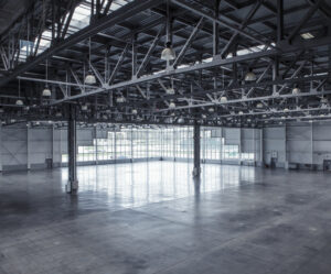 Interior of an empty warehouse with glass wall Interior of an empty warehouse with glass wall